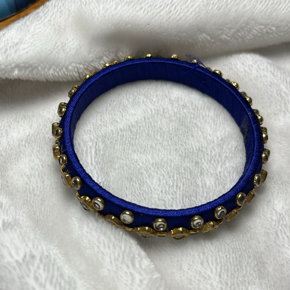 Bangle, royal blue, rhinestones round and square,wrapped thread covering.